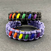 Parachute Cord Rainbow Bracelet in 550 Paracord, Cobra Style, with rainbow accents. Show your Pride.